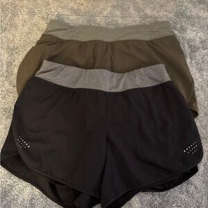 TWO women’s athletic shorts- medium